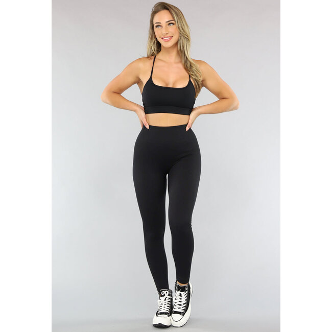 Schwarze Rippensport-Tights mit Scrunch-Effekt