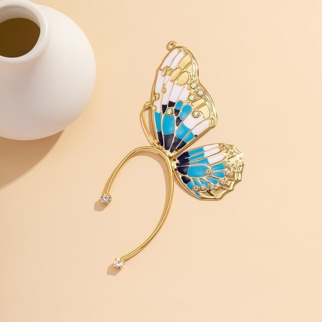 Ohrring mit blauem Schmetterlingsdesign