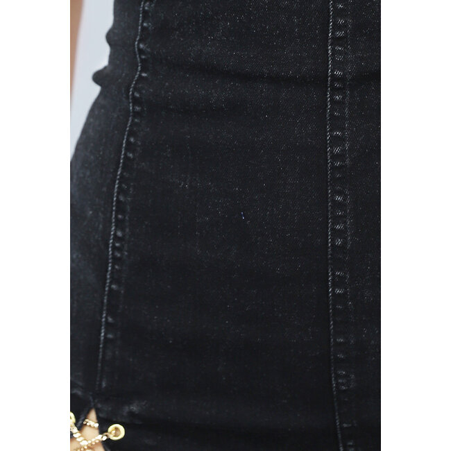 Schwarzer trägerloser Denim Playsuit mit Kettendetail