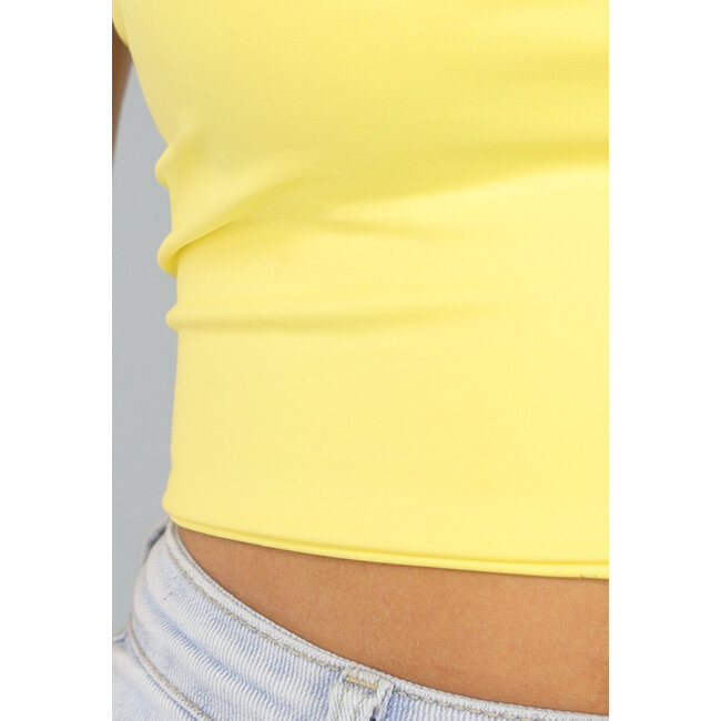 Buttergelbes Sport-Top mit herausnehmbaren Pads und Schleifen-Detail