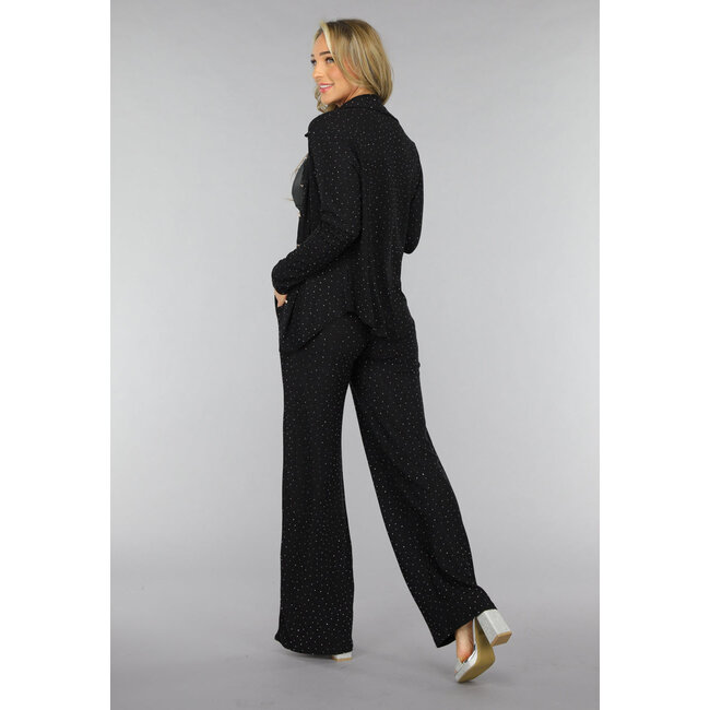 Schwarze langärmelige Glitzerbluse