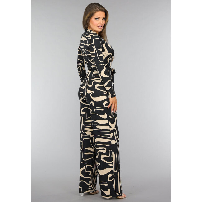 Schwarzer Jumpsuit mit beigefarbenem Muster und Gürtel