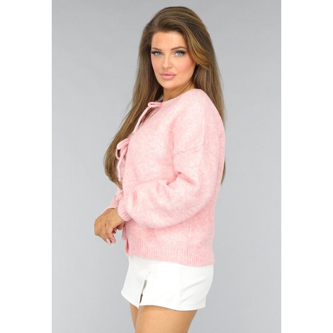 Rosa gestrickte Strickjacke mit Schleife