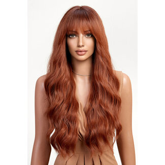 Orange gewelltes Haarteil mit Pony