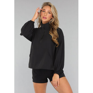 Schwarzes Sport-Set mit Windbreaker