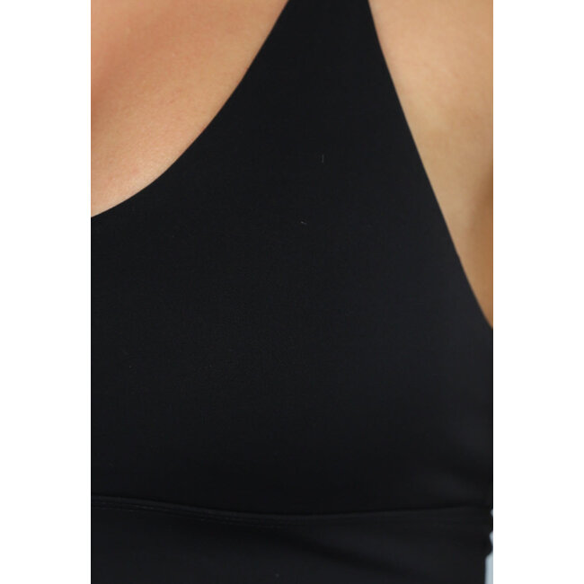 Schwarzes Sportset mit Faltenrock