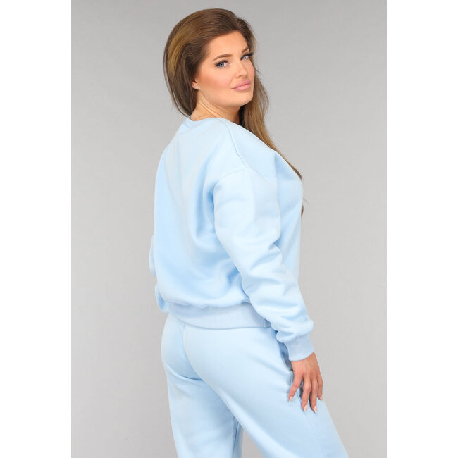 Hellblauer Fleece-Hausanzug