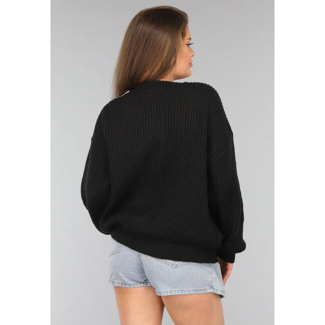 Schwarzer Strickpullover mit Puffärmeln