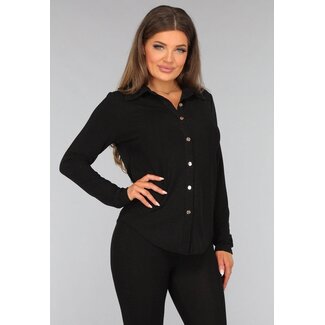 Schwarze Glitzerbluse mit goldenen Knöpfen