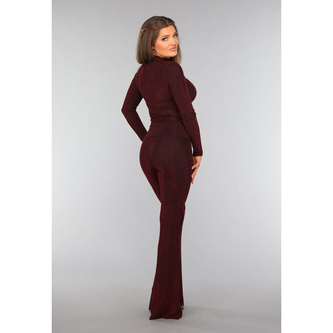 Elastische, lange Schlaghose mit rotem Glitzer