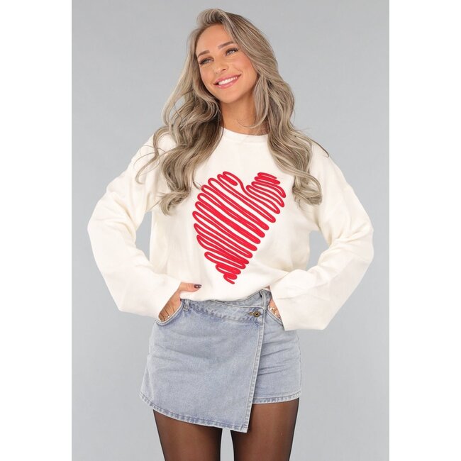 Weißer Pullover mit rotem Herz
