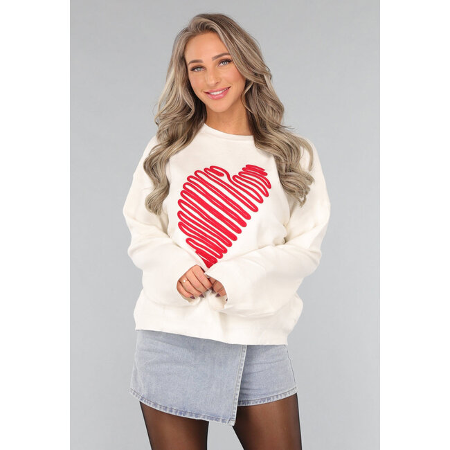 Weißer Pullover mit rotem Herz