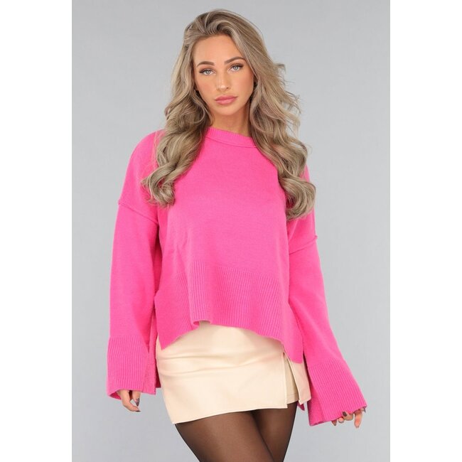 Rosa Strickpullover mit weiten Ärmeln