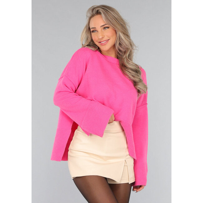 Rosa Strickpullover mit weiten Ärmeln