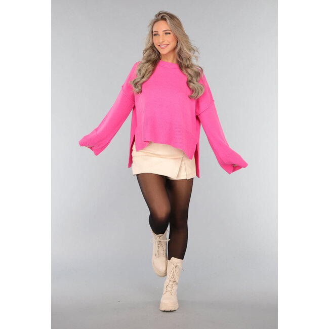 Rosa Strickpullover mit weiten Ärmeln
