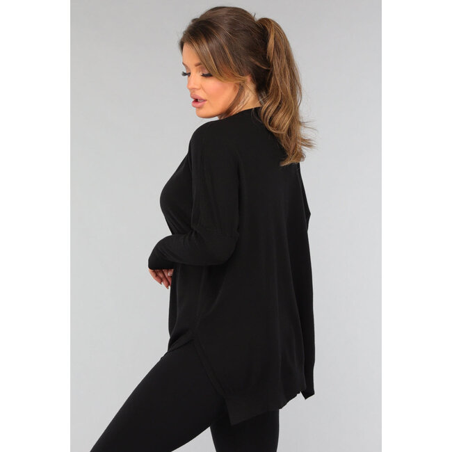 Schwarzes Twinset mit taillierter Hose