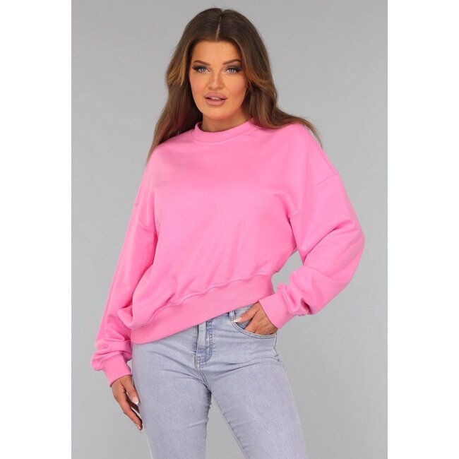 Rosa asymmetrischer Pullover