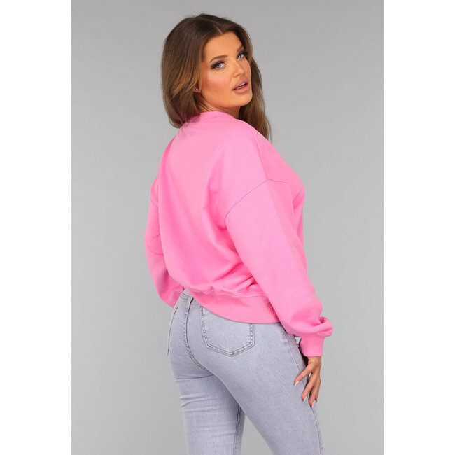 Rosa asymmetrischer Pullover