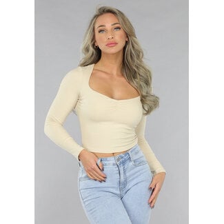Beigefarbenes Rippen-Top mit kleinem Knittereffekt