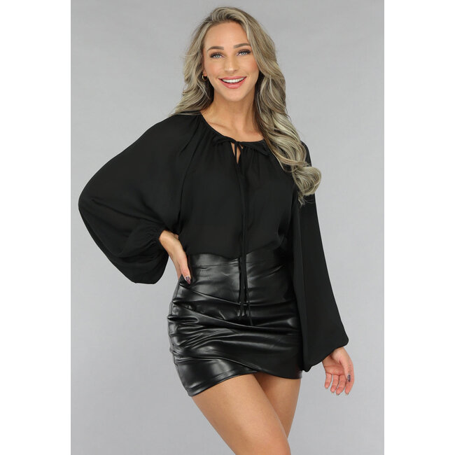 Schwarze Chiffonbluse mit Puffärmeln