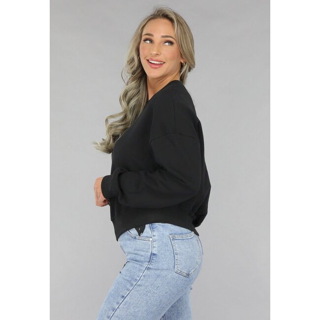 Schwarzer Pullover mit Rundhalsausschnitt