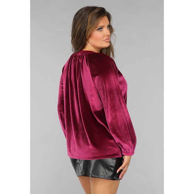 Kirschrosa Samtbluse mit Puffärmeln