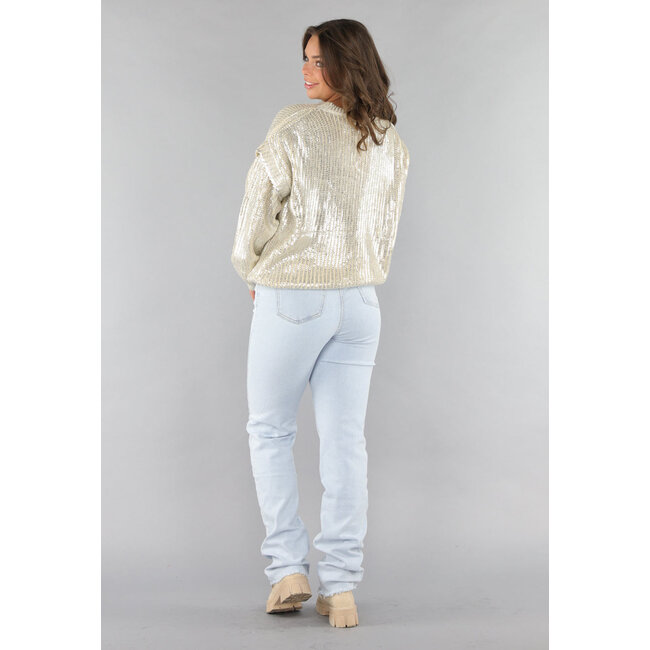 Beigefarbener Strickpullover mit Silberbeschichtung