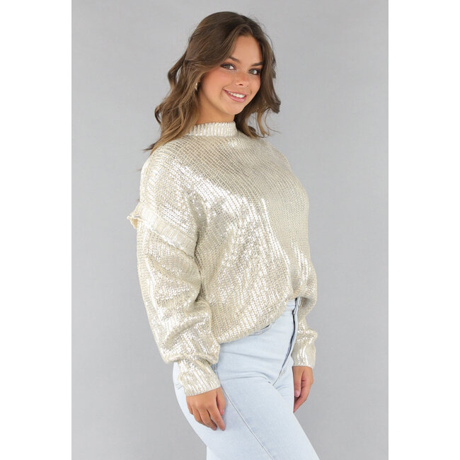 Beigefarbener Strickpullover mit Silberbeschichtung