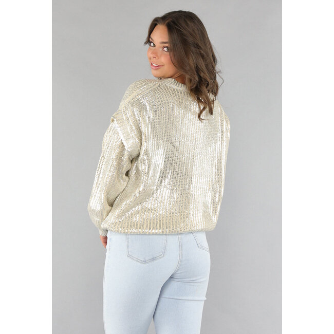 Beigefarbener Strickpullover mit Silberbeschichtung