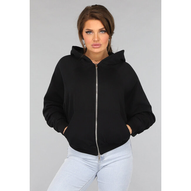 Schwarze Strickjacke in Übergröße mit silbernem Reißverschluss