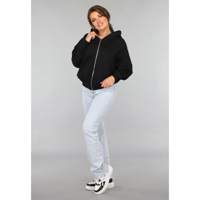 Schwarze Strickjacke in Übergröße mit silbernem Reißverschluss