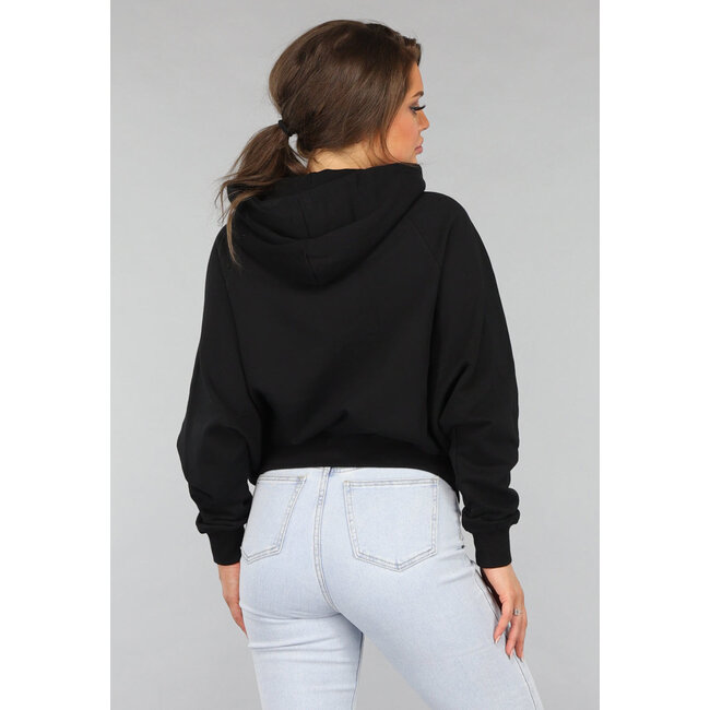Schwarze Strickjacke in Übergröße mit silbernem Reißverschluss