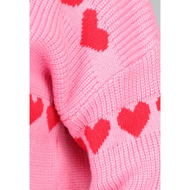 Hellrosa Strickpullover mit roten Herzen