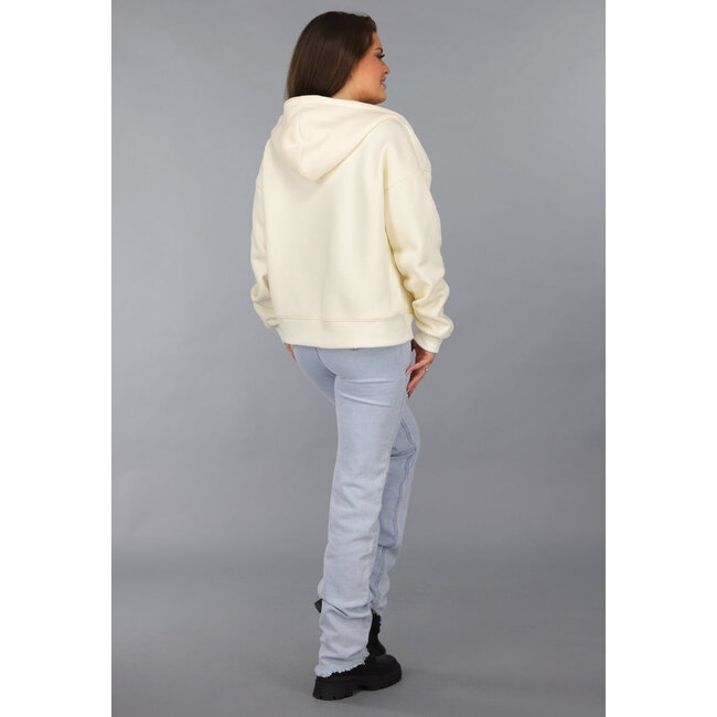 Übergroße Strickjacke in Ecru mit Seitentaschen