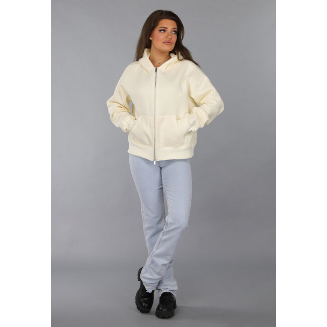 Übergroße Strickjacke in Ecru mit Seitentaschen