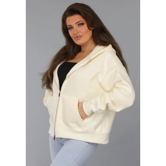 Übergroße Strickjacke in Ecru mit Seitentaschen