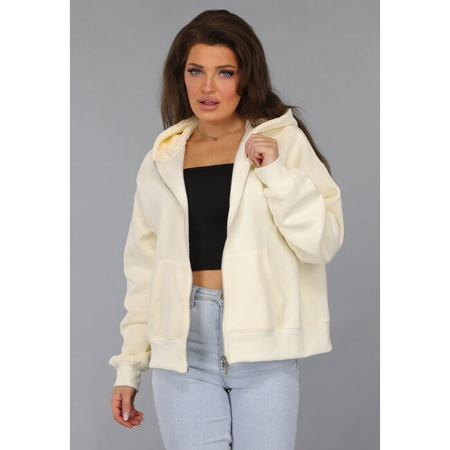 Übergroße Strickjacke in Ecru mit Seitentaschen