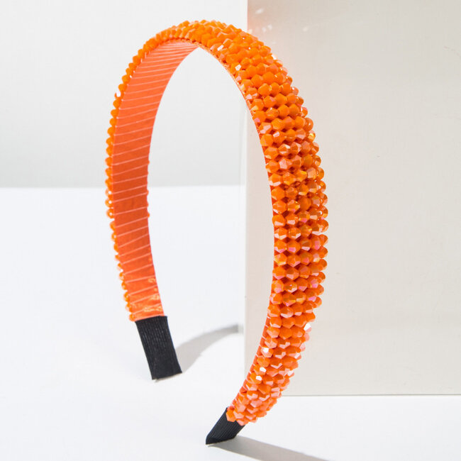 Orangefarbenes Perlen-Kopfstück