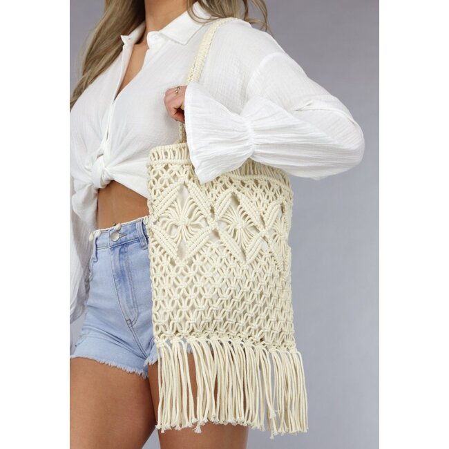 Beige gehäkelte Strandtasche mit Fransen
