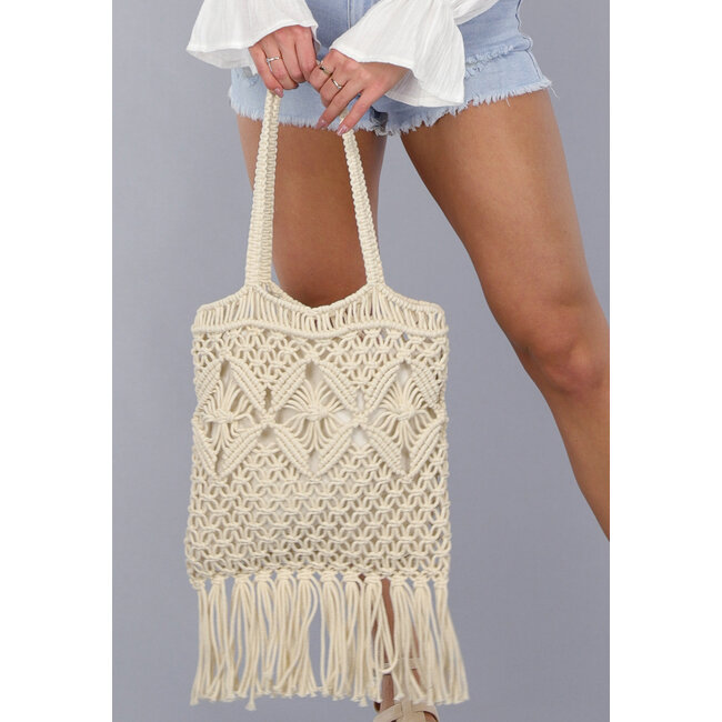 Beige gehäkelte Strandtasche mit Fransen