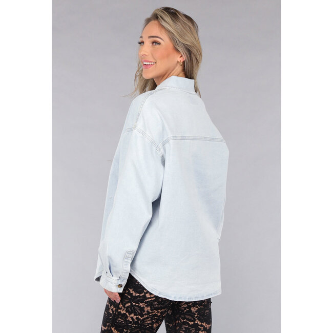 Hellblaue Denim-Bluse mit Knopfverschluss