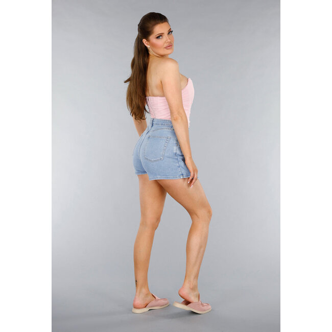 Denim-Stretch-Skort mit rosa Sternen und Overslag
