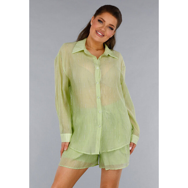 Grünes zweiteiliges Set mit durchsichtiger Bluse und elastischer Short