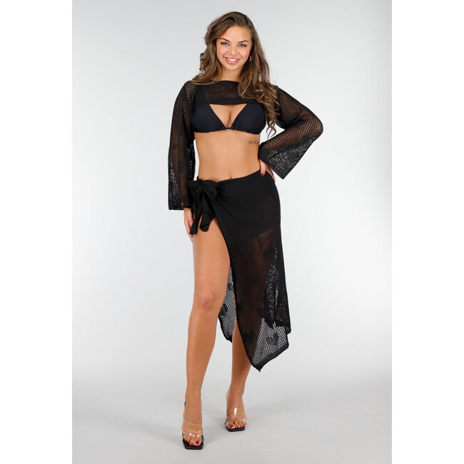 Elegantes schwarzes gehäkeltes Strandtuch für stilvollen Sommerlook