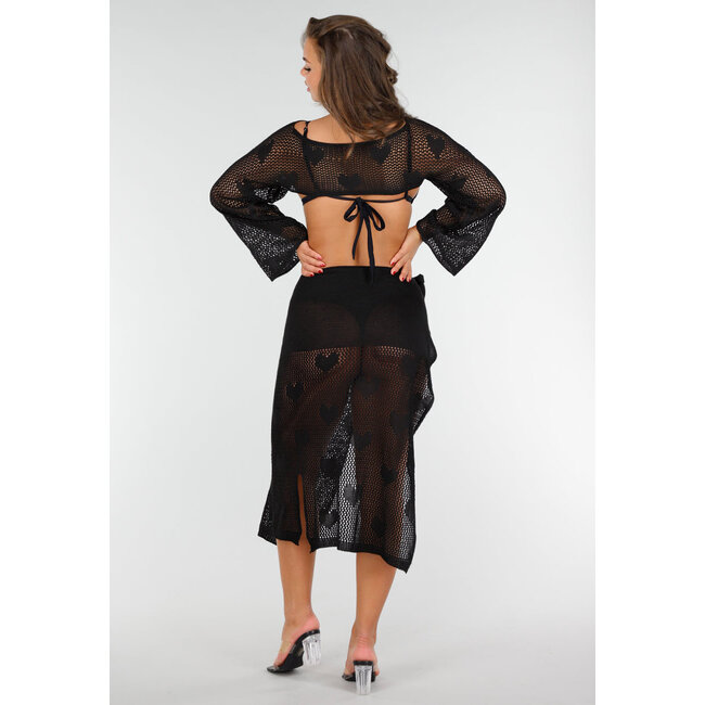 Elegantes schwarzes gehäkeltes Strandtuch für stilvollen Sommerlook
