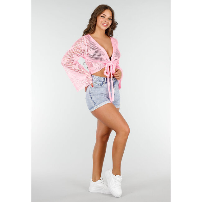 Hellrosa gehäkelte Strickjacke mit Herzen für Sommertage