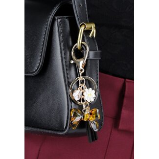 Goldfarbener Taschenanhänger mit Leopardenschleife