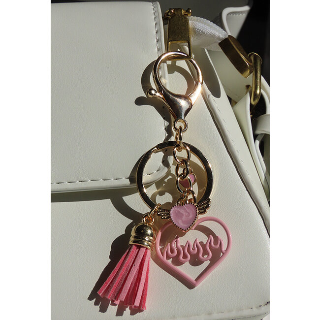 Schlüsselanhänger in Schwarz und Rosa mit Fransendetails