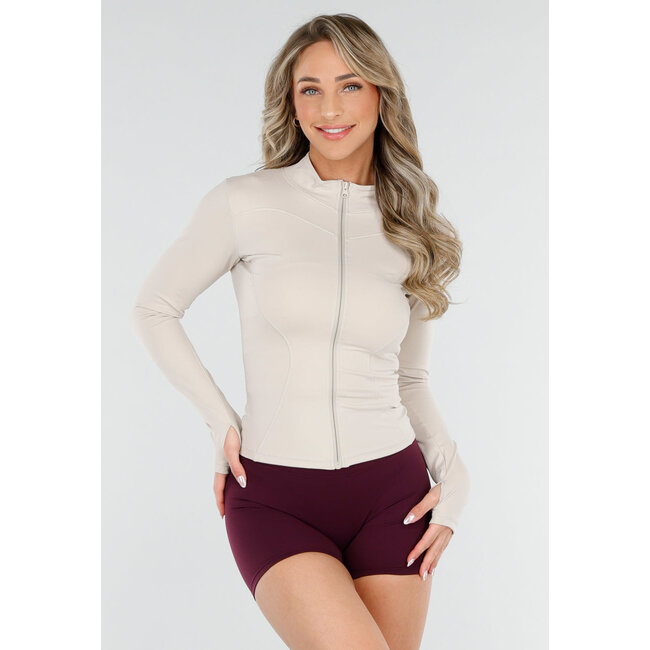 Taillierte beigefarbene Stretch-Sportstrickjacke mit Daumenlöchern und Stehkragen