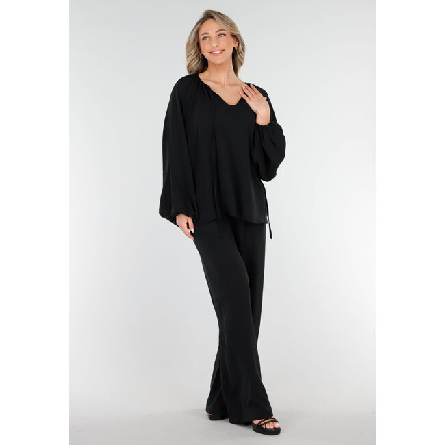 Schwarze geknöpfte Bluse mit V-Ausschnitt und langen Ärmeln